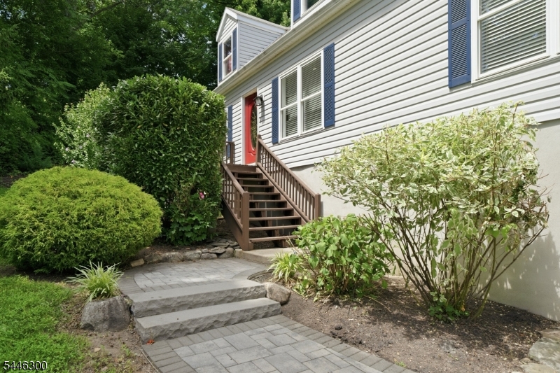 Welcome home to this beautifully updated residence in one of Butler's most sought-after neighborhoods. Nestled on a quiet, welcoming street, this move-in-ready home offers the perfect blend of comfort, space, and convenience. Inside, you'll find a bright open-concept living and dining area, a stylish kitchen with stainless steel appliances, a pantry, center island, and a convenient laundry room. The first floor features a spacious primary suite with a private bath, plus an additional bedroom. Upstairs offers four more bedrooms and a versatile bonus room. The basement provides extra living space, while two large decks, an expansive backyard, a two-car garage, and ample driveway parking make outdoor living and entertaining a breeze. Ideally located near parks, schools, shopping, major highways, and NYC transportation, this home is perfect for today's lifestyle.
