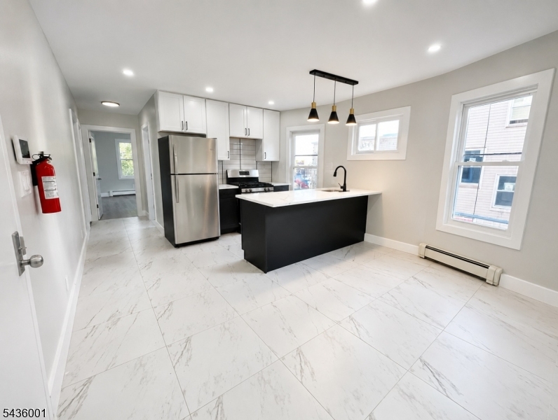 Beautifully Renovated 2-Story Apartment Modern, Clean, and Conveniently LocatedEnjoy comfortable living in this beautifully updated 2-story apartment located near shopping, parks, public transportation, and everyday conveniences. This clean, stylish, and modern unit offers a spacious and well-maintained layout.Apartment features include an updated kitchen with granite countertops, new appliances, a bright and functional layout, and modern finishes throughout.