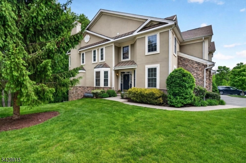 Fabulous Syracuse unit, largest model offering exceptional space, style and amenities in the highly desirable Forges community. This end unit features a 2-story foyer, kitchen with granite countertops and stainless-steel appliances, opening to elegant living and dining spaces. The living room showcases gleaming hardwood flooring, a gas fireplace and sliders leading to private deck, gas BBQ hook-up and amazing, wooded views, while the dining room offers hardwood flooring and a charming bay window. A den/office, powder room, and laundry room leading to the 2-car garage complete the first level. The second level features a luxurious primary suite with a sitting room, two oversized walk-in closets and spa-like ensuite with jacuzzi style tub, large stall shower, along with a loft area, and two additional spacious bedrooms and guest bathroom. The fully finished walk-out basement, includes a full bathroom, abundant storage space, and sliders leading to a patio, providing additional entertaining space. Residents enjoy resort-style amenities, including a beautiful clubhouse with a gathering room, fitness center, billiards and card room, heated outdoor pool, tennis/pickleball courts. Conveniently located just minutes from major highways, shopping, dining and train access. Whether it's a trip to the Jersey Shore or skiing on the slopes at High Point, ideal location puts you at the corner of it all. Luxury living awaits you with style and comfort! Some pics virtually staged.