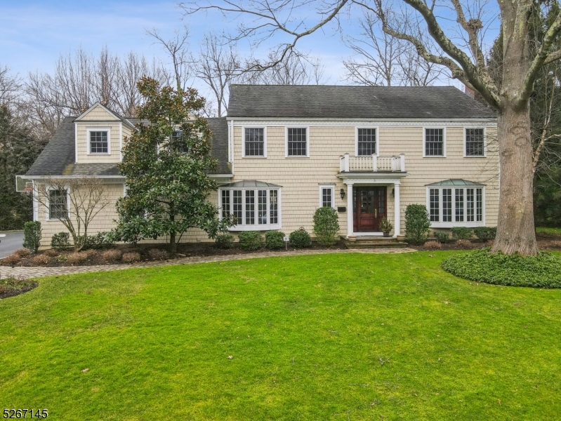 Your dream home! This Mint Condition 6 bedroom Colonial expanded & renovated to perfection! The home features a huge, stunning gourmet eat-in kitchen w/ designer cabinetry, top of the line appliances, center island, & sunlit eating area w/ French doors to bluestone patio, summer kitchen & a spectacular pool on totally level, fenced property. The kitchen is totally open to family room w/ gas fireplace flanked by custom built-ins, and great natural light because it's south facing! Spacious Living Room features a gas fireplace & great natural light w/ bay window overlooking the front yard. Formal Dining Room is large, perfect for hosting, & has a bay window overlooking the front yard. Convenient 1st floor laundry & easy access to attached 3-car heated garage. On the 2nd level, the primary suite is a luxurious oasis w/ custom walk-in closet & new spa-like bath w/ steam shower, jacuzzi & radiant heated floor. There are 5 more bedrooms & 2 more new baths, both with showers over jacuzzis, & 1 of the bedrooms is a new addition & has backstairs, so it could be a great guest suite. The lower level is beautifully finished with a huge rec room w/ exercise area & full bath. Outdoor pool shower w/ hot & cold water. Every Pella window, every door & light fixture is new! All new plumbing. Ideally located on quiet street walking distance to highly rated Hartshorn Elementary School (0.6 miles), Cora Hartshorn Arboretum (0.7 miles) & Short Hills Train Station (0.9 miles). Move right in & enjoy!