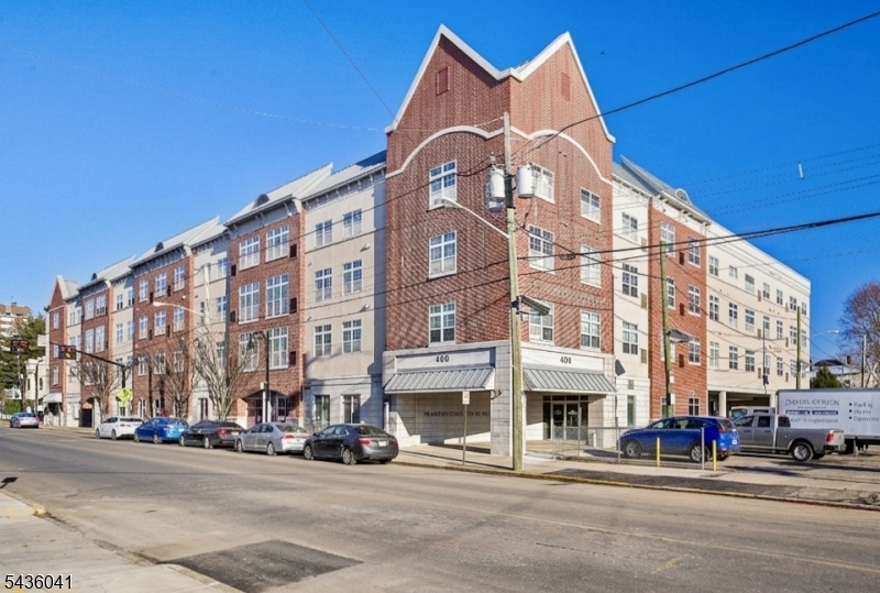 Enjoy spacious condo living in this oversized 2-bedroom, 2 full bathroom unit in the heart of Plainfield. This well-maintained home features an open-concept living and dining area that flows seamlessly into a spacious kitchen featuring abundant cabinetry and storage. Both bedrooms are generously sized, including a primary suite with a large closet and plenty of room for a full furniture set without feeling crowded. Large windows throughout fill the space with natural light, creating a bright and inviting atmosphere. Convenience is key with in-unit laundry, assigned parking so you'll never have to search for a space, and elevator access for quick and easy entry. The building also offers secure access from both the main entrance and parking area, along with extra-wide doorways that make moving in simple. Low-maintenance, spacious, and centrally located this is comfortable condo living at its best.