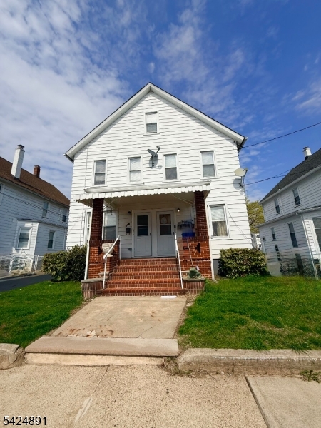 Rare opportunity to own a true side by side duplex, proudly held in the same family since 1940.  Properties like this rarely come on the market,offering both character and long-term pride of ownership. The left unit, 119 offers added living space with a finished basement and finished attic-ideal for extended living , recreation, or flexible use.  The unit on the right 121, feautures a spacious and traditional layout with three bedrooms, living room, dining room and an eat-in kitchen, along with 1 1/2 baths.Each uniot has it's own private entrance, providing a more single family feel- perfect for tenants or owner occupants. Whether you are looking for a solid investment, multigenerational living, or the opportunity to live in one unit while renting the other,this property delivers versatility and value. A rare chance to own a well-maintained duplex with  decades of history behind it.