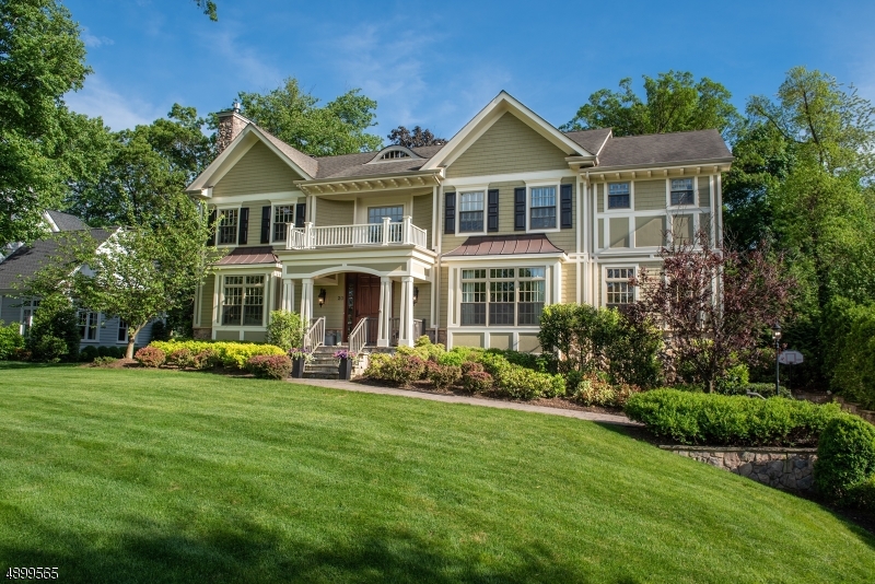 Stunning  2010 6BR 5.2 Bath Colonial in coveted location close to Franklin School and New Providence train station. Featuring a gracious Entry Foyer, Custom Kitchen w/ White Cabinets, Huge Center Island, Top of the Line Appliances, wet bar & sunny Breakfast Room open to the Family Room w/ Gas FP & French doors to patio & professionally landscaped level yard .Formal Living Room w/Gas FP & Formal DR are perfect for entertaining Sonos Sound System and a Private Bedroom w/ Full Bath. Second level boasts a lovely Master Suite w/ Sitting Room, elegant bath & 2 walk-in closets, 4 additional BR's & 3 Full Baths and a convenient Laundry Room. The finished Lower Level includes a spacious Rec. Room, Powder Room, Mudroom and 2 entrances to the 3 car garage. Custom Millwork & Moldings.