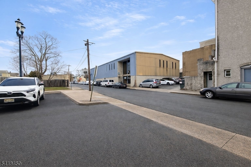 This Somerset County facility is a turnkey solution for large-scale bakery production or food manufacturing. Spanning a generous 16,740 sq. ft. lot, the property is strategically located with immediate access to Route 22, providing seamless logistics to Routes 78 and 287. Impressive 25-ft clear ceilings and a dedicated drive-in loading dock. Fully equipped with an industrial walk-in freezer and refrigerator. Includes professional-grade industrial ovens and a suite of baking equipment. Large receiving room and 10 dedicated parking spaces located directly across from the property. A full second level featuring 7 private offices, 2 conference rooms, a coffee break room, and 2 restrooms. An on-site display and storefront area, perfect for direct-to-consumer sales or a flagship showroom. Whether you're looking to expand an existing food brand or launch a centralized distribution hub, this versatile property offers the infrastructure to scale immediately.