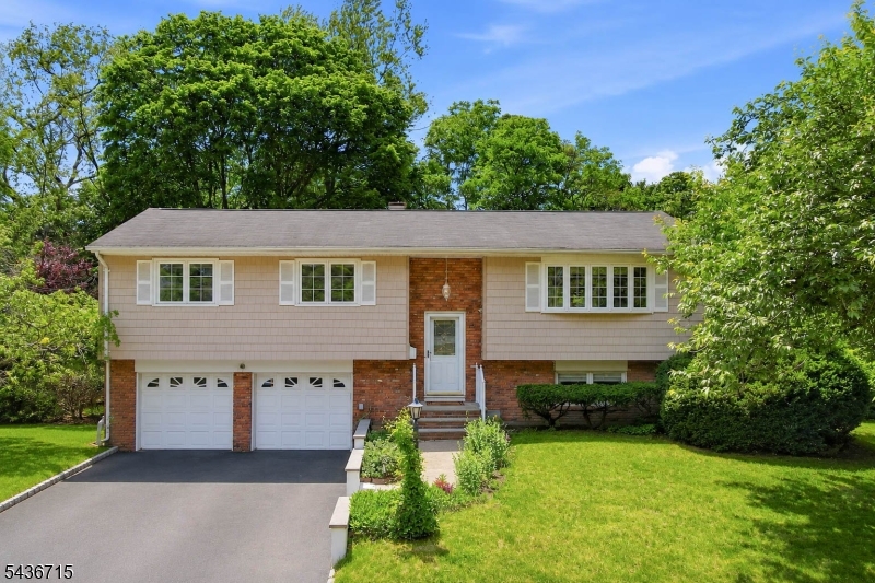 While East Brunswick is a major commuter hub, 8 Nottingham offers the perfect contradiction: a private, tree-lined cul-de-sac. This 4-bedroom, 1.5-bathroom bi-level home features an open-concept first floor where the living and dining rooms flow seamlessly into one another. Bay windows and sliders leading from the deck to the updated kitchen, flood the space with natural light. The oversized deck   an oasis in its own right, surrounded by an abundance of trees offering plenty of privacy   just might be the best room in the house! Also on this level, you'll find three bedrooms bathed in natural light and a full bathroom with both an entrance into the primary bedroom and hallway. Head downstairs to a spacious family room complete with a fireplace, perfect for cozy winter evenings. Step through another set of sliders onto the back patio and into an expansive yard (nearly half an acre) ... plenty of room for a swingset, a hammock, and everything in between. 8 Nottingham is a true gem. Don't miss it!
