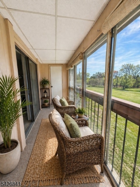 Welcome to Clearbrook where comfort and lifestyle come together in this one-bedroom, one-bath condominium. Located on the third floor, this inviting home features high ceilings and an open-concept layout that enhances both space and natural light. The galley kitchen is thoughtfully designed with a convenient breakfast bar, perfect for casual dining or entertaining. A full bathroom with a tub/shower combination complements the generously sized bedroom, which offers excellent closet space for storage and organization. The spacious living and dining room combination is bright and airy, with sliding glass doors that lead to a private balcony. Here, you can unwind with your morning coffee while enjoying peaceful views of the beautifully maintained golf course. Clearbrook offers a vibrant, resort-style lifestyle with exceptional amenities, including a clubhouse, community pools, golf, pickleball, billiards, a woodworking shop, craft rooms, and a wide variety of clubs and social activities. Ideally situated near major highways, shopping, dining, and transportation to New York City, this home provides both convenience and an active, engaging community experience.
