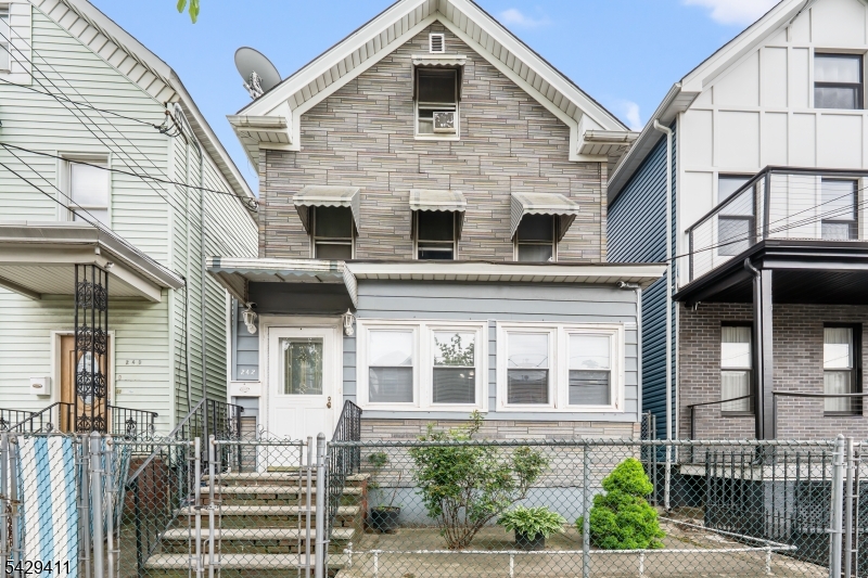 Welcome to this spacious and move-in ready home located at 242 Franklin Ave in the heart of Elizabeth, just minutes from Newark Liberty International Airport and approximately 1.5 miles from Elizabeth Station with direct service to NYC! This beautifully maintained property offers an incredible amount of living space across multiple levels. The first floor features a welcoming living room, formal dining room, updated kitchen, one bedroom, a full bath, and direct access to the backyard   perfect for entertaining or relaxing outdoors. The second floor offers four generously sized bedrooms and an additional full bath. Need even more space? The fully finished attic includes an extra room and full bath, ideal for a guest suite, home office, or recreation space. The partially finished basement features three additional rooms, a full bath, and a separate entrance, offering endless possibilities for extended living or flexible use. Very affordable taxes!  Conveniently located near major highways, shopping, restaurants, public transportation, and Newark Airport, this home combines space, functionality, and location all in one. A fantastic opportunity for anyone looking for a move-in ready property with room to grow!