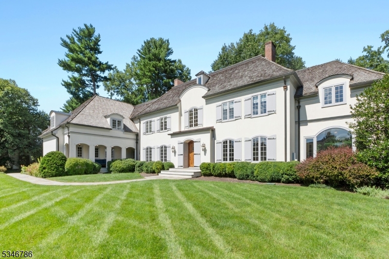 Incredible custom home, built on one level acre, situated on coveted Linden Lane, a private road in the Rolling Hills Section. Exceptional blend of timeless elegance and modern comfort. It's beautiful design features 7 bedrooms, 8 bathrooms, and a sun-filled, open layout perfect for both entertaining and everyday living. At the heart of the home, the chef's kitchen includes updated Sub Zero and Wolf appliances, custom cabinetry, wet bar and a spacious island that invites conversation over morning coffee or evening cocktails. The adjoining family room, with its cozy fireplace and wall of windows, overlooks the lush backyard, heated pool and gas firepit, offering a tranquil retreat for relaxation or outdoor entertaining.The primary suite is a sanctuary, boasting a spa-like ensuite, a generous walk-in closet, and peaceful views that make every morning feel like a getaway.Beyond the home itself, 15 Linden Lane offers the lifestyle you've been searching for. Situated in one of Chatham's most sought-after neighborhoods, you're minutes from top-rated schools, vibrant downtown shops and dining, and effortless access to NYC. Whether it's an evening stroll through tree-lined streets or a weekend spent exploring nearby parks, this home is a perfect backdrop for a life well-lived.