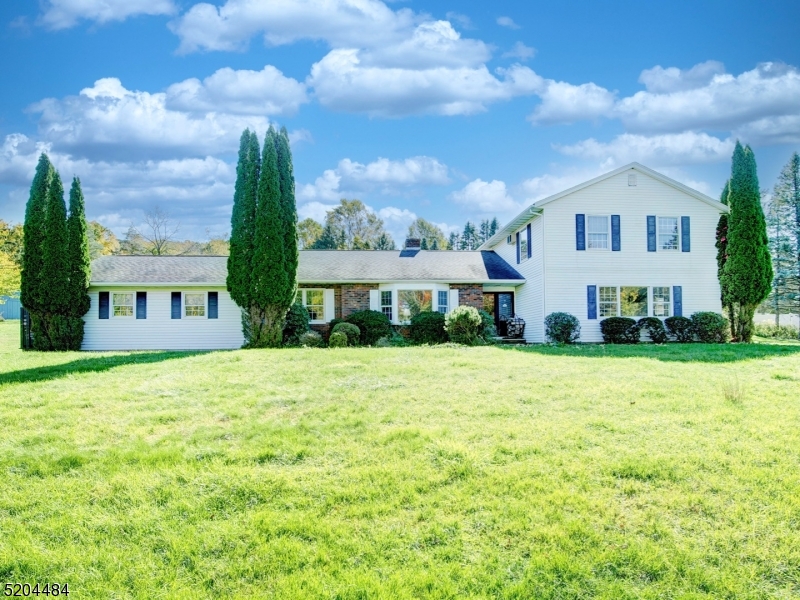 THIS HOME IS SITUATED ON 1.77 PARK-LIKE, PRIVATE ACRES. IT HAS  5 BEDROOMS, 3 FULL BATHS.  HOME IS VERY SPACIOUS. IT HAS A PRIVATE, FIRST FLOOR GUEST SUITE WITH TWO BEDROOMS, FULL BATH,  SUMMER KITCHEN WITH ACCESS TO SIDE YARD.  THE ROOF IS APPROXIMATELY 12 YEARS OLD. THIS IS AN ESTATE SALE AND IS STRICTLY BEING SOLD AS IS. THIS COMMUTER-FRIENDLY HOME LOCATED IS VERY CONVENIENTLY LOCATED CLOSE TO ROUTE 206, STORES, RESTAURANTS, SCHOOLS & PARKS. PRICED TO SELL!