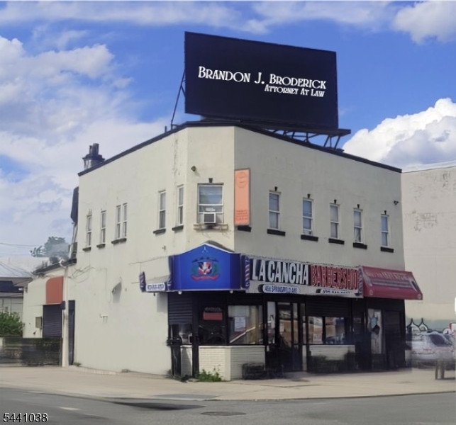 Take advantage of an opportunity to diversity your portfolio owning an income producing commercial property in a highly visible location, prime redevelopment section of Newark, diagonally across from Home Depot.Includes Two storefronts (specifically a renovated barbershop paying $2,321.72 per month (annual 5% rate increase); a convenient store paying $2,600 per month)(annual increase of $1200); one upstairs office space (paying $1,906.17 per month)(annual 3% increase); and a maintenance free billboard ($1500 per month) (assumes responsibility for roof repairs). Cap rate will continually increase each year. *Sold As Is. City and State documents/ inspections are buyer's responsibility