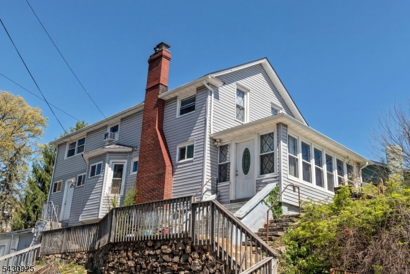 Unique investment property comprised of 4 units with amazing lake views of Lake Hopatcong.  This ONE OF A KIND opportunity consists of four individual homes with separate utilities and long term histories of solid leases in place. ONE MAIN HOUSE & 3 COTTAGES with shared driveway parking, detached storage sheds and small lawn areas. The main house and one of the cottages have been recently updated and the entire property is in overall good condition.  Assume all four leases for a seamless transition of ownership with current annual NOI of approximately $54K. Public water and sewer is here! Located in the heart of the popular redeveloped main lake section of Hopatcong surrounded by lake views, lakeside dining, boating and beach activities as well as schools, shopping and transportation. Solid cash flow and higher income potential than current.