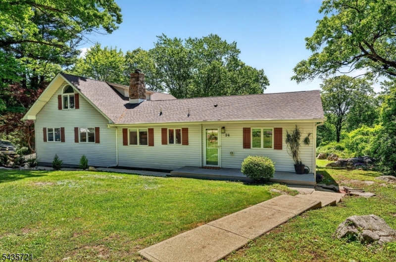 Tucked away at the end of a private rd, this custom-built home offers a wonderful balance of privacy, comfort, & convenience. Set on 1.44 scenic acres, the property enjoys a peaceful, natural setting while remaining just minutes from shopping, dining, major commuting routes, & everyday necessities. Offering 3BR, 3BA, & 2,336 sq ft of living space, this home was thoughtfully designed for both everyday living and entertaining. The inviting Family Room features a pellet stove that provides warmth, efficiency, & ambiance throughout the colder months. Generous living spaces, abundant natural light, & a flexible floor plan create an easy flow throughout. Outdoor enthusiasts will appreciate nearby access to Teetertown Ravine Nature Preserve, where miles of trails, footpaths, picnic areas, & scenic overlooks provide endless opportunities to explore & enjoy nature. Significant improvements completed within the past several years incl a new roof '26, CAC system '25, chimney liner, deck, cedar board-&-batten shutters, updated flooring, fresh interior paint, trim work, garage insulation, patio slider, & more. The kitchen has been refreshed w/butcher block countertops, SS sink, tile flooring, & updated appliances. Addt'l features include a 2 car garage, workshop, water softener, Andersen storm door, BBHW heat, & numerous thoughtful upgrades. A unique opportunity to enjoy a serene country setting with the convenience of nearby amenities, recreational opportunities, & easy lifestyle.