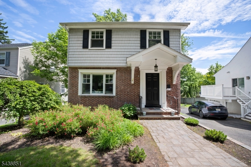 Move right into this beautifully updated, turnkey home on a quiet street in desirable Millburn. Meticulously maintained and low maintenance, this mint-condition home offers 3 bedrooms, spacious living and dining rooms with beautiful bay and picture windows, gleaming hardwood floors, and a charming kitchen featuring GE Cafe appliances.Two stylish bathrooms and a fully finished lower level with recessed lighting provide flexible space for a family room, home office, or recreation area. Premium Pella windows bring in abundant natural light while enhancing energy efficiency and comfort.Additional highlights include 200-amp electrical service, a Generac standby generator, built-in garage, ample off-street parking, private patio, and professionally landscaped grounds.Ideally located within walking distance to Wyoming Elementary School, downtown Millburn shops and restaurants, and the NJ Transit Midtown Direct train station. Low taxes, top-rated schools, and exceptional convenience make this move-in-ready home a rare opportunity for buyers seeking comfort, value, and a worry-free lifestyle.