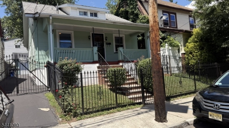 This home is waiting for you to come and add your special touch to it. Enjoy your mornings and evenings relaxing by sitting in your rocking chair on the front porch.. Two car garage and additional parking in yard for three cars. Eat in kitchen.