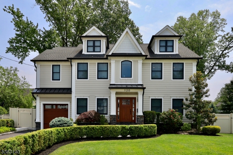 WELCOME HOME to 120 Cottage Place! This property is just 7 years young, is designed with modern conveniences & elegant finishes, & is sure to please even the most discerning! Nestled in a quiet, quaint neighborhood, just a few blocks to the elementary school, this home offers sophistication, elegance, & convenience. The 1st floor offers an open concept floor plan designed for everyday functionality as well as entertainment. The home is light, bright, & airy & is designed with finishes that are sure to please. The formal living room opens into the spacious family room, which is open to the kitchen, complete with center island, gorgeous finishes, & every convenience. The formal dining room, as well, is extremely inviting & exquisitely finished. The mudroom & powder room are further amenities that are beautifully finished. Four expansive bedrooms are on the 2nd floor, including a gorgeous primary suite with dual walk in closets & ultra luxurious primary bath. The laundry room & hall bath are also spacious & exquisitely finished. On the 3rd level, a full guest suite with en suite bath offers privacy for guests, or can serve as a home office space far from the main living area. The finished basement will not disappoint, with high ceilings, a full bath, & large rec room. The back patio is finished with stunning pavers, fire pit, & a full fence, offering privacy and comfort. The whole house generator & high-end extensive home security system complete this luxurious home.
