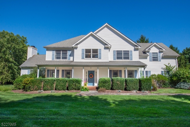 Gorgeous 4 bedroom, custom built Colonial, with 4 full bathrooms, spacious 3 car garage, and a finished basement. Enjoy entertaining guests in the large updated eat-in kitchen with center island and sliders leading to the back deck. The backyard resembles a park-like setting, on 2.75 acres of flat and open property with a beautiful in-ground pool. This home also features a large rocking chair front porch set back from the street, central air, hardwood floors on the 1st and 2nd floor, 9' ceilings, bright and welcoming 2 story entryway, and cathedral ceiling in the family room. The expansive master suite features a Juliet balcony overlooking your private oasis backyard with an ensuite sitting room and spa bathroom leading into a custom boutique closet. Move right into this jaw-dropping home, unpack and start living life!