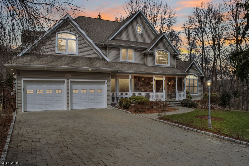 Amazing colonial in Montvale with over 4,000 square feet of living space on over an acre is not to be missed. The bright and airy kitchen features granite counters, a center island, and a breakfast nook surrounded by windows. Imagining entertaining in the large family room with a floor to ceiling stone fireplace and large windows overlooking the beautiful landscaped property. The second floor features the homes four bedrooms including the impressive master suite. With a bathroom featuring a large tub and steam shower, a walk-in closet and additional storage the master is truly impressive. The enormous finished basement with a rec room and den with possible in law suite complete this magnificent home.