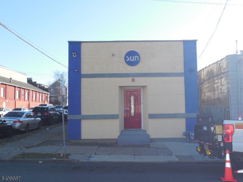 Completely renovated move in condition commercial building ready for new owner to open their own business. Stucco exterior, new sheetrock & freshly painted interior, new tile flooring, updated 200 Amp. 3 phase electrical service, new garage door, new Gas H/Air & Central Air unit. 1st Floor is currently large open space & could be portioned off into office space if needed or keep as a warehouse & storage facility for a contractor the options are endless. Full unfinished basement for more storage. New garage door on left side of the building for loading & unloading supplies. Convenient location. Building was previously used as a screen-printing shop for signs, T-shirts & promotional products.