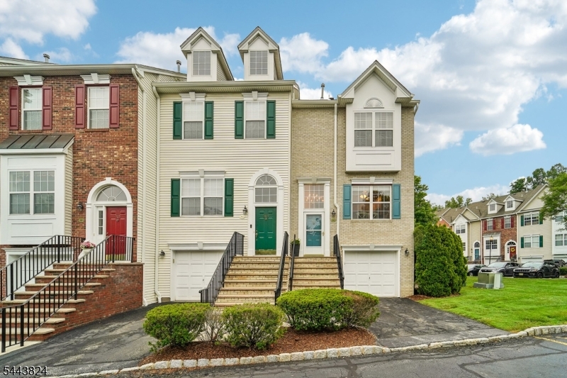 Proudly presenting this beautifully maintained end-unit townhome in the highly sought-after Cambridge Heights community. Offering approximately 1,944 square feet of thoughtfully designed living space, this home combines comfort, style, and convenience in one of Butler's most desirable communities.The inviting main level features an updated kitchen and pantry, a powder room, a spacious dining room, and a spacious living room centered around a cozy gas fireplace, perfect for entertaining or relaxing at home. Upstairs, you'll find two generously sized bedrooms, including a spacious primary suite with a private en-suite bath and walk in closet.  An additional full bathroom and laundry closet completes this floor. The finished ground level offers a versatile family room with walk out access, creating the perfect space for movie nights, a home office, or recreation. A one car attached garage and abundant storage throughout complete this exceptional home.Enjoy all the amenities Cambridge Heights has to offer, including a clubhouse, fitness center, swimming pool, beautifully maintained grounds, and a carefree lifestyle with exterior maintenance, landscaping, and snow removal handled by the association. This is a rare chance to own one of the community's most desirable home styles. Don't miss it!