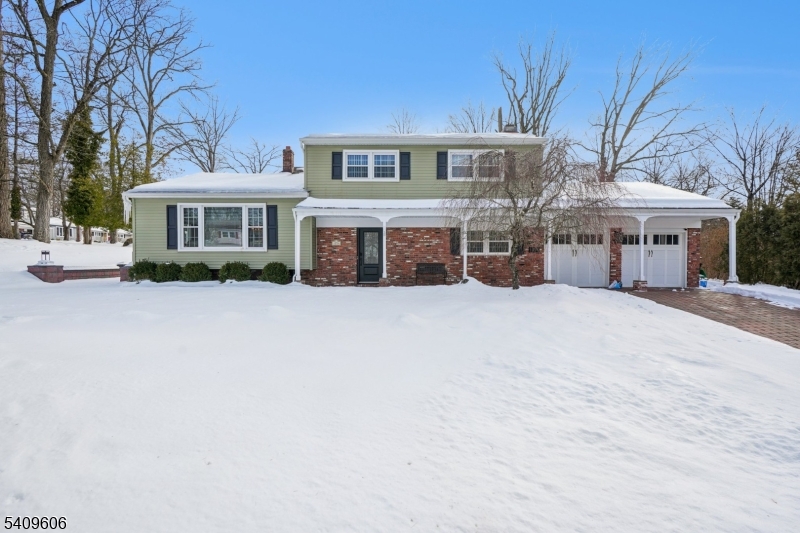Welcome home to this spacious bi-level property, ideally situated on a desirable corner lot. This home is filled with natural light and features a modern, kitchen complete with stainless steel appliances. Designed for both everyday living and entertaining, the home offers generous indoor and outdoor space. Highlights include recessed lighting throughout and cozy wood burning fireplace in the family room, which opens through French doors to the patio. Step outside to your private, fenced backyard featuring an in ground pool perfect for summer entertaining. a must see home ready for its next owner.