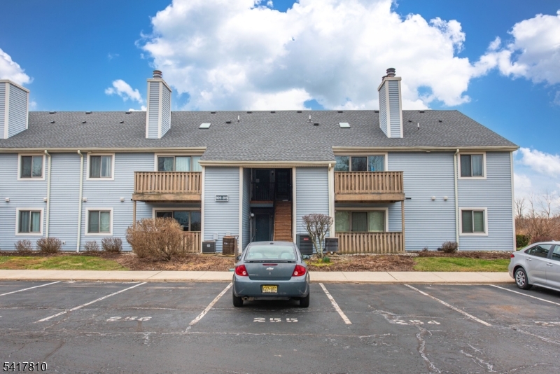 Welcome to this very affordable, move-in ready 1-bedroom, 1-bath second-floor unit offering comfort, convenience, and great community amenities. This updated home features an open floor plan filled with natural light, highlighted by a skylight and vaulted ceilings in the living room that create a bright and spacious feel. The cozy living area includes a wood-burning fireplace and sliding doors leading to a private balcony, perfect for relaxing outdoors. Positioned in a back-facing location, the unit offers a quiet and private setting within the community. The open and updated kitchen features granite countertops and flows seamlessly into the main living space, making it ideal for everyday living or entertaining. Laminate flooring runs throughout the home for a clean, modern look and easy maintenance. The generously sized primary bedroom offers a walk-in closet for ample storage. Additional features include central air, forced hot air, and a newer roof. Residents enjoy excellent community amenities through the HOA, including a pool, tennis courts, playground, and designated grilling areas perfect for relaxing or gathering with friends and neighbors. This is a fantastic opportunity for affordable, low-maintenance living.