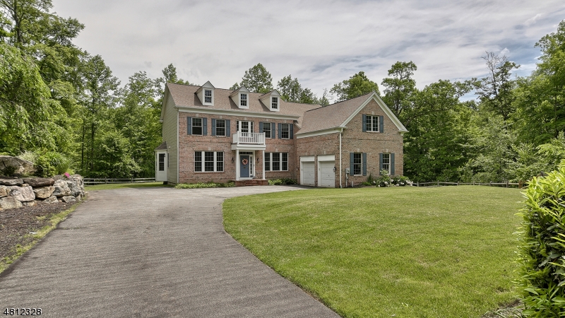 Nestled amidst a private lot in coveted Stonetown stands this stately colonial poised to be your "Dream Home."  Designed for both living an entertaining, the three sprawling floors of living space provide the perfect backdrop for any occasion.  Nature abound, the home tastefully boasts: a breathtaking great room, spacious gourmet eat-in kitchen, office, stunning master suite with sitting room/ample closets/large bath, a finished lower level with massive wine cellar, flat yard, generator, and so much more! Don't miss this opportunity, Schedule your private tour today.