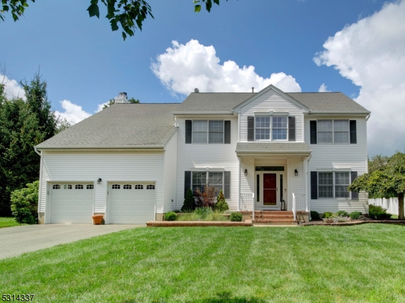 Welcome home to this beautiful Classic model in desirable Poets Peak featuring large, flat, private yard with patio and gorgeous in-ground pool. This is the yard of everyone's dream.  Enter to the two story foyer with first floor home office to the left. The formal living and dining rooms are perfect size for entertaining. The large kitchen features center island, white cabinetry, corian countertops, pantry & separate dining area. The two story family room is adjacent to kitchen and features a stone fireplace. Second floor features large primary suite with two walk-in closets and large bath with vaulted ceiling, dual vanity, soaking tub and stall shower. 3 other bedrooms and updated main bath complete the second floor. The bedroom at end of hallway has 2 closets plus an area behind left closet that can be finished as a walk in closet or made as an extension to the bedroom. Second floor hallway also has open area to family room. The basement has been framed for future finishing. Public Utilities here. Hurry, this one won't last! Please note pool heater is not working and is being sold as is.