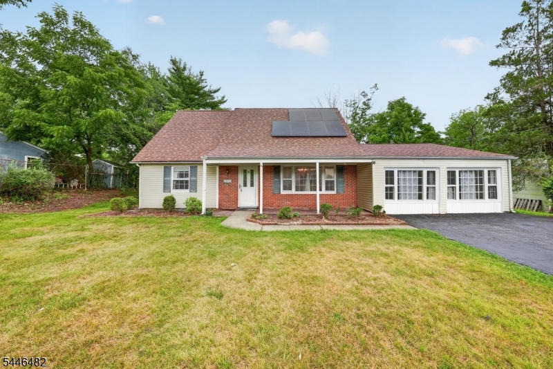 Welcome home to this charming Cape Cod nestled on a beautiful lot that offers the perfect blend of comfort, space, and natural beauty. Featuring 4 bedrooms (with 2 on the main level and 2 upstairs) and 2 full bathrooms (one on each level), a dedicated home office, and a versatile den, this home provides flexible living spaces perfect for everyone. The sun-filled interior is enhanced by abundant natural light, creating a warm and inviting atmosphere throughout. The kitchen showcases granite countertops and ample cabinetry. A spacious family room serves as the heart of the home, offering plenty of room for gatherings. Retreat to the generously sized primary bedroom, complete with a private balcony and walk-in closet. Step outside to the welcoming covered porch or relax and entertain while taking in the beauty of the expansive yard. Additional highlights include solar panels for increased energy efficiency and lower utility costs. Conveniently located near shopping, dining, parks, and major commuter routes, this exceptional home is ready for its next chapter. Don't miss the opportunity to make it yours!