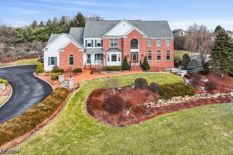 Your dream home awaits at this private oasis located on a quiet cul-de-sac in one of Randolph's most desirable neighborhoods. Resting on just over an acre of landscaped & private property, this gorgeous home features 4 BR's, 2 full & 2 half BA's. The Renovated kitchen features custom cabinets w/ soft-close custom drawers, hideaway cabinets w/ pullout lifts, granite counters, marble backsplash, soapstone sink w/ filtered cold & instant HW, top of the line Thermador appliances, radiant heated flooring and more. The Primary suite on the 2nd floor features a tray ceiling, custom blinds, hardwood floor, 2 walk-in closets & an en suite spa-like full BA with jacuzzi tub, Hotwater baseBOArd radiant heat floor, double sinks w/ granite counters, privacy door for the stall shower & toilet. The 2nd floor features Hardwood throughout, 4 bedrooms, a main BA and a 34x11 gorgeous bonus recreation room. private and beautifully landscaped, this property is magnificent. Enjoy the Bluestone patio in the rear yard w/ a outdoor custom bar area featuring a pergola, counters, a built-in grill w/ gas burners, a stone fireplace & a hot tub. 3 car garage, a circular driveway, custom lighting, beautiful landscaping complete the outdoor features.