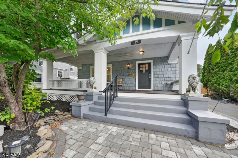 Completely renovated and thoughtfully upgraded, this move-in-ready home beautifully blends timeless charm with modern conveniences. Every detail has been tastefully updated while preserving the home's unique character. Step inside to an inviting open-concept layout featuring neutral paint, newer flooring, and abundant natural light. The stunning kitchen offers granite countertops, stylish tile backsplash, premium stainless-steel appliances, and plenty of cabinetry perfect for everyday living and entertaining. The spacious living room features a beautiful fireplace, creating a warm gathering space. The second floor offers four generously sized bedrooms and a beautifully updated full bathroom, while an additional full bath on the main level adds convenience. Enjoy peace of mind with a roof, HVAC system, and central air conditioning only six years old. Outside, the home impresses with a charming front porch, new oversized driveway, paver walkways, spacious deck, cozy paver fire pit, large fully fenced backyard, and a detached garage/carriage house offering additional storage and versatility. Meticulously maintained and truly move-in ready, this exceptional home offers the perfect combination of character, quality, and modern updates. Don't miss your chance to make it yours!