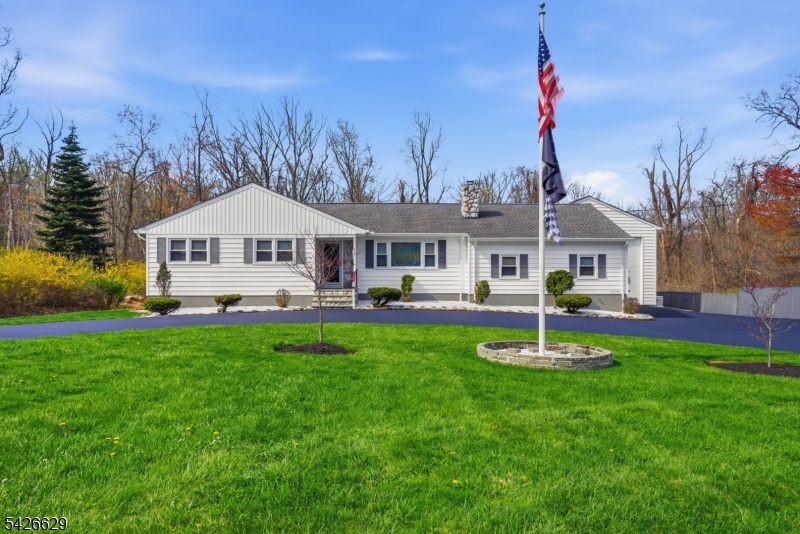 Nestled on a beautifully maintained one-acre property in Randolph, this truly one-of-a-kind ranch offers the perfect blend of comfort, space, and versatility. Immaculately kept and completely move-in ready, this home showcases pride of ownership at every turn. A large circular driveway provides ample parking and a welcoming first impression, while the expansive property offers both privacy and room to enjoy the outdoors. Inside, the home features three spacious bedrooms, two full bathrooms, and a convenient powder room, along with first-floor laundry for easy everyday living. The heart of the home includes a bright breakfast area with sliders leading to a deck, perfect for indoor-outdoor entertaining. The inviting living room is anchored by a cozy wood-burning fireplace, creating a warm and comfortable atmosphere. Downstairs, an enormous recreation room offers endless possibilities whether you're envisioning a home theater, gym, game room, or additional living space. Car enthusiasts, hobbyists, or those in need of extra storage will appreciate the (70x28)TEN+-car attached garage with 16ft ceilings, complete with heating, cooling, and a large 14ft garage door for added functionality. This exceptional property combines thoughtful design, generous space, and a prime location an opportunity not to be missed.