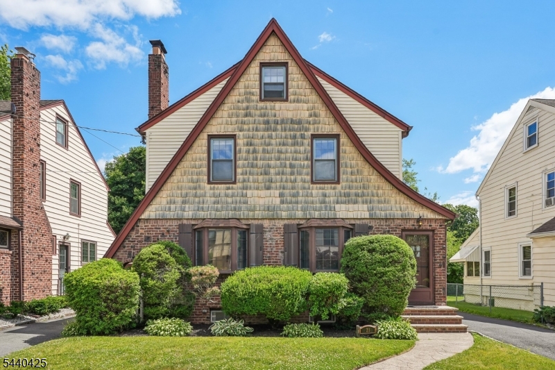 Welcome to this classic 3 bedroom, 1.5 bath Tudor-style home, where old-world charm meets modern functionality. Featuring beautiful hardwood floors, spacious rooms, and architectural character throughout, this home offers warmth, comfort, and plenty of room to grow.The inviting living room and formal dining room provide ideal spaces for everyday living and entertaining. Generously sized bedrooms offer comfort and flexibility, while the finished basement adds valuable living space perfect for a family room, home office, gym, or recreation area.Enjoy your morning coffee in the sunlit enclosed porch or backyard patio. A third-floor bonus space provides endless possibilities as a playroom, studio, guest area, or additional workspace. Storage is abundant throughout the home,with cedar closets ensuring everything has its place.Complete with a garage and numerous desirable features, this Tudor gem offers the perfect blend of charm, space, and practicality. Conveniently located near shopping, dining, schools, parks, and major commuter routes, this is a wonderful opportunity to own a home full of character and potential. Don't miss the chance to make this timeless Tudor your own!