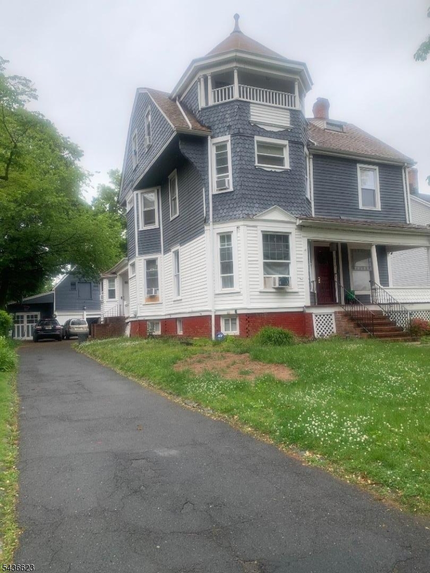 Enjoy living  in this huge Colonial Home in The Presidential Heights Section of East Orange.The Home features 8 bedrooms , 6 full baths with Finished Basement.Beautiful Renovated Kitchen with Center Island. Second Floor Features Master Bedroom W/Master Bath. Enjoy Summer BBQ in Nice size Backyard. Long Driveway to 3 Detached Garage With Loft for storage.
