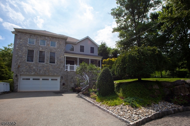Resting on almost a third acre of beautifully landscaped property is this impressive, east facing colonial. Centrally located to take full advantage of all this upscale community has to offer, this is a home with exceptional living space both inside and out. From its covered front porch, you step inside where you are greeted by a dramatic two-story foyer. Generously proportioned rooms are arranged in an easy flow, designed for entertaining on a grand scale. Clearly the center of activity, the kitchen and family room form a social hub calling everyone to gather. With French doors leading out to the deck and saltwater pool, entertaining easily continues to outdoor living. At the end of a busy day, four well designed bedrooms provide restful sleep and personal space for all. Finished basement with garage access.