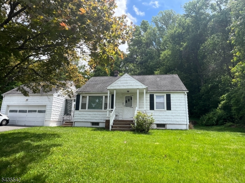 Super Sweet, updated 2 bedroom  & 1 full bathroom RANCH on great lot in convenient area. All one level for easy living. Freshly painted, newer kitchen, bathroom & appliances. Beautiful resurfaced hard wood floors. Full use of very large basement with washer/dryer (not provided by owner) hook-ups. Wide driveway for lots of parking and 2 - car garage. Gorgeous private propery on almost full acre. Public sewer & water (to be paid by tenant). NO Pets - NO exceptions. NO Smokers. Limit 4 occupants.  OCCUPANCY - AUGUST 1, 2026