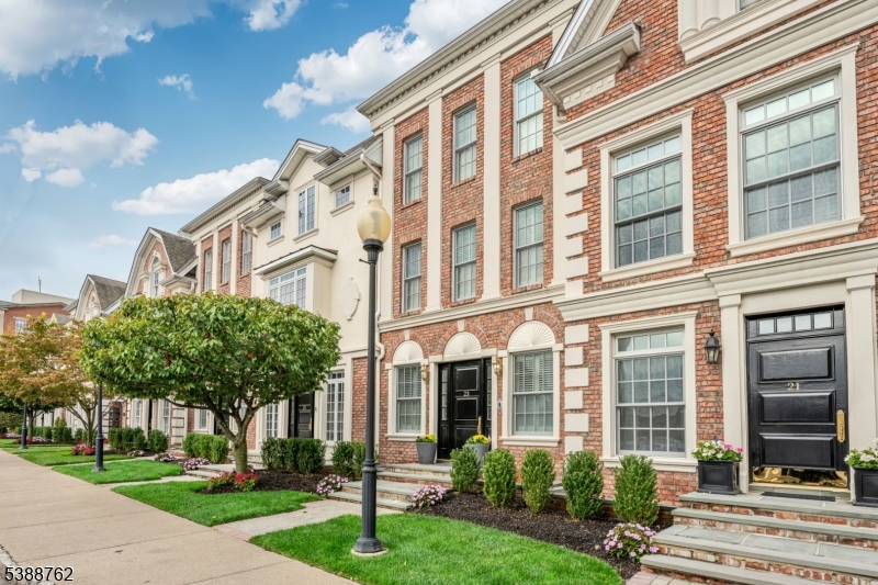 Embrace the ultimate lock-and-leave luxury lifestyle in the heart of downtown Morristown! This stunning 4-level Georgetowne townhome offers the spaciousness of a single-family home with zero exterior maintenance. A PRIVATE ELEVATOR seamlessly connects all four floors, making everyday living an absolute breeze.The ground floor features a welcoming living room and large entry closet. On the main level, entertain effortlessly in the gourmet eat-in chef's kitchen, boasting a large center island, dining space, and a full suite of Wolf and Sub-Zero appliances. The kitchen flows right into a formal dining room and a bright family room centered around a cozy gas fireplace.Upstairs, retreat to the serene primary suite featuring two walk-in closets and a renovated spa-like bath with a soaking tub, separate shower, and dual vanities. The lower level provides a private 3rd bedroom suite complete with a walk-in closet and a luxurious steam shower?perfect for guests or a home office.Why worry about yard work when the town is your backyard? Leave your vehicles in the attached 2-CAR GARAGE (with ample guest parking to spare) and step outside. You are mere steps from Morristown's vibrant dining scene, boutique shops, theater, and the Midtown Direct NYC train. Finished with beautiful hardwood floors and plantation shutters, and part of the Morris School District (full-day public Pre-K from age 3). A rare, turnkey opportunity!