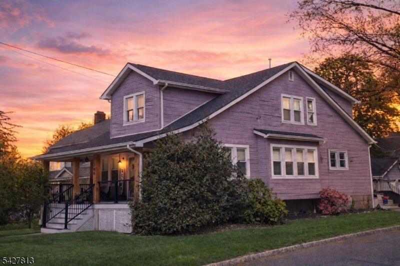 Welcome home to this charming craftsman style expanded cape. This 5 bedroom 3 bath home is larger than it appears and is conveniently located close to the NJ Transit bus stop, major highways, parks, shopping, and dining. The home features a detached two-car garage as well as additional parking, a patio, and an updated and spacious front porch, perfect for morning coffee or an evening glass of wine. The front porch is constructed with all composite materials allowing for maintenance-free living. The sun-drenched first floor of this home features original hardwood floors, 2 bedrooms and a full bath, a large living room with recessed lighting and a gas fireplace (with new liner, insert, and repointed/replaced brick), formal dining room, mudroom, and an updated kitchen with tile floors, granite countertops, tile backsplash, and stainless steel appliances. The 2nd level features an primary suite with a walk-in closet and full bath, along with a 2nd bath and 2 other bedrooms each with walk-in closets and hardwood floors. The large basement is unfinished and perfect for storage, recreation, and/or future expansion. The home also features a french drain, and 2 zone central air and heat (new furnace). All of this is located in a lovely neighborhood and community with great schools! This large and unique Sears Roebuck house has tons of character and must be seen to be appreciated!