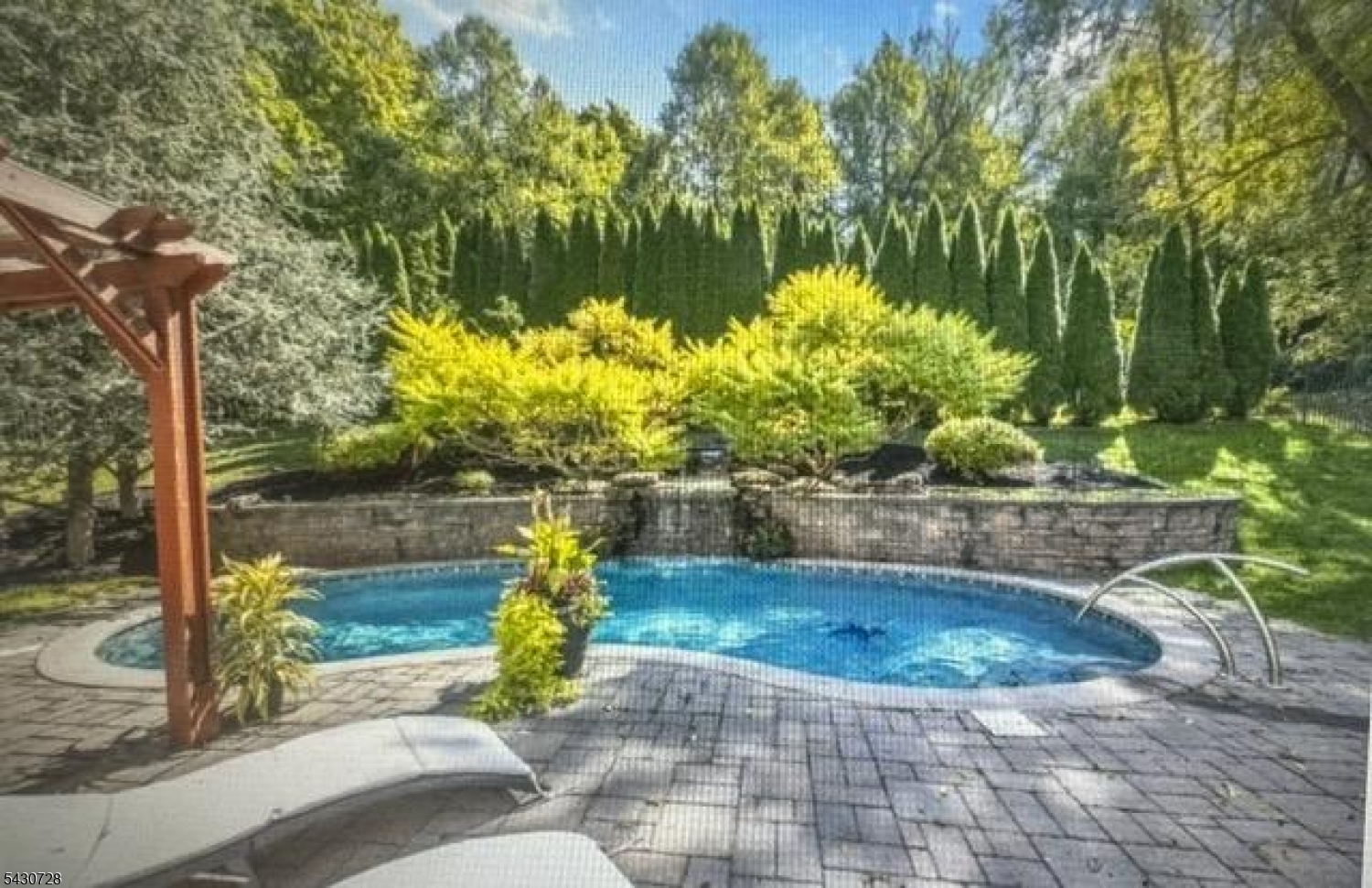 This is the one you've been waiting for. A showstopping Vernon Colonial perched with breathtaking Tri-State mountain views   visible right from the classic front porch swing. Outside, a saltwater Gunite pool with waterfall and custom landscaping set the scene for unforgettable summers. Inside, soaring open spaces, a stacked stone gas fireplace, and a gourmet granite kitchen with center island deliver the "wow" factor at every turn. A den with French doors, custom bookcases, and a main-level study offer room to work, relax, and recharge. The lavish primary suite is the perfect place to lay your head. Marble primary bath with Jetted tub. Stall shower. Walk-in closet. Plus 4 bedrooms, 2.5 baths, hardwood floors throughout, and a finished basement with an oak bar and gas fireplace for effortless entertaining. Central air. 2-car garage. Homes like this don't last   schedule your showing today.