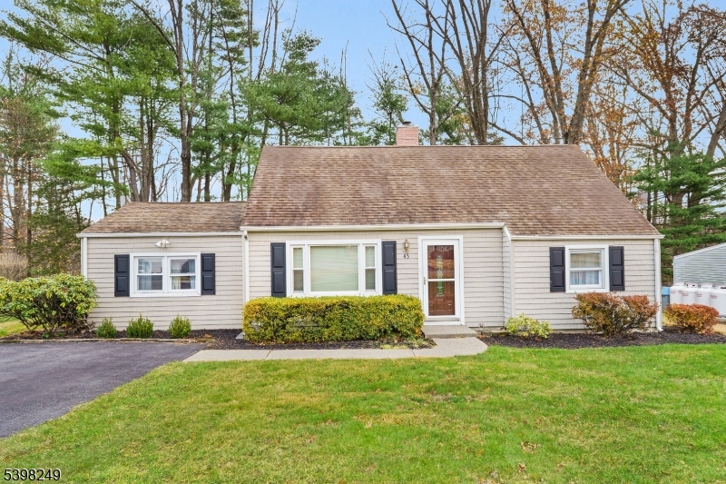 Welcome to 45 Memory Lane, a charming west front facing 3-bedroom, 2-bath plus bonus office home is set on a flat, private lot in Denville's highly desirable Beacon Hill neighborhood. The backyard offers peaceful wooded views & in the near distance a picturesque pond, creating the perfect winter backdrop for ice skating & year-round enjoyment of nature. Inside, the home features a flexible & functional layout ideal for both everyday living & entertaining. The first level includes a bright living room, an updated kitchen with stainless steel appliances, a comfortable family room, 1 bedroom, plus office/bdrm & a full bath. Upstairs, you'll find 2 additional bdrms & another full bath, offering space & privacy for fam, guests, or a home office. Major system updates provide peace of mind, including a furnace & water heater that are just 2 years old. Natural gas is available on the street for easy conversion in the future. Newer above ground oil tank is out back. A storage shed adds extra functionality, & the level yard is perfect for outdoor entertaining, play, or gardening. Conveniently located near the Mount Tabor Train Station with NYC-bound service, major highways, & just minutes to DWTN Denville, the historic Mt. Tabor Camp Association, Morris Plains, & Morristown Green, this home offers the perfect blend of serenity & accessibility. A rare opportunity to own in one of Denville's most desirable neighborhoods. This house is ready to welcome you home.