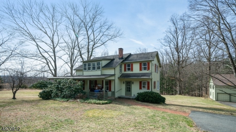 Magnificent property in historic Washington Valley section of Morris Township that backs to protected land, your own private oasis can be yours!  This 4 bedroom, 2.1 bath colonial farmhouse features wide plank floors, beamed ceilings, architectural moldings, 2 wood-burning fireplaces & more!  The eat-in kitchen has wonderful pastoral views as well as the family room with 3 walls of windows.  The 3 car detached garage offers additional space above for just about anything.  Just minutes from the center of Morristown Green, restaurants, train, schools and more!