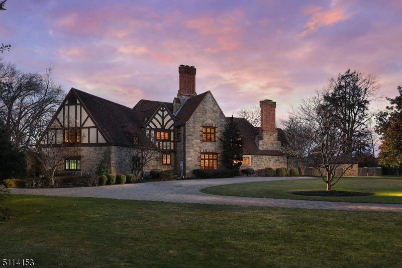 FOR COMP PURPOSES ONLY. One of Westfield's most prominent homes, this exceptional French Normandy style home is set on 1.1 acres of property offering stunning views of Echo Lake CC. Some of its exquisite features include spacious rooms, cathedral ceiling, custom millwork & stone FP. 1st floor incl Great Room w/22' cathedral beam ceiling & FP, sun room, private office & EIK kitchen w/center isl breakfast bar, prof grade SS appliances, Taj Mahal quartzite countertops & sep eating area. 2nd level MBR suite w/luxurious bath & WIC plus addl 3rd level dedicated WIC, 2 en-suite BRs, 2 addl BRs & full bath. LL rec room, exercise rm & wine rm. The vast property includes a circular drive, heated garage, patio, heated saltwater Gunite pool & pool house w/full bath. Whether formally entertaining or casually relaxing, this home has it all!
