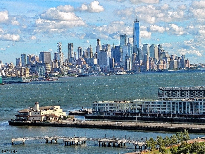 Located atop the cliffs of the historic Kings Bluff section, this home is in a one of a kind prime location with panoramic views of the NYC skyline. Your chance to own on a tranquil dead end st. having few homes directly facing NYC with unobstructed views. Top schools and rapid NYC commute, this builder's home has a granite stone and brick exterior, Spanish tile roof, pool, Jacuzzi, sun deck, patio, 2 car heated garage, 4 car driveway. Inside is 5,586 sf, 7 BR, 5 Full Baths; finished attic with Br facing NYC, bath; ground level Br suite with views, kitchen, bath, LR. Other features include master suite w/sauna, 2 fireplaces, sunken LR, den, sun rm, dining rm, custom archways, granite counters, oak flrs, marble stairs, 4 zone AC, freshly painted; new natural gas boiler and 5 zone hot water based heating.