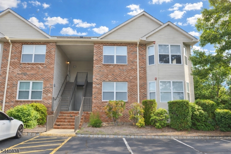 PICTURE PERFECT! Gorgeous 2-bedroom, 2-bath end-unit in the highly desirable Hanover Park Community, completely updated in 2024! This move-in ready home features tons of updates and new flooring! The spacious living room and formal dining area offer the perfect setting for everyday living and entertaining. Stunning updated kitchen with quartz countertops, a breakfast bar, pantry, and stainless steel appliances. The lavish primary suite features two closets and a beautifully updated bath with a stall shower. A second bedroom and updated main bath complete the interior. Enjoy the convenience of an in-unit washer and dryer, plus an amazing private balcony with beautiful views. Community amenities include a pool and playground, perfect for summertime enjoyment. Two assigned parking spaces plus additional guest parking. Prime location close to major highways, shopping, dining, and NYC transportation.