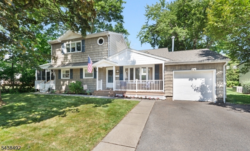 Location, Location. Location! Welcome to this picture perfect split level home nestled on a Cul-de-sac located in this desirable Springfield neighborhood. This 4 bedroom 2 1/2 bath home features beautiful HW flrs, a light and bright living room with High Ceilings, Skylight and Gas Fireplace.  The kitchen has 1 yr young Stainless steel appliances, plenty of cabinet space including a pantry area that leads to a tranquil, relaxing but spacious porch. Ground level features a large family room, Office or bonus room, laundry area, half bath, access to backyard and access to garage w/ pull down steps that leads to loft storage! The Primary bedroom has Closets galore, Full Bath w/ Jetted tub. 3 addition bedrooms complete the 2nd floor all with double closets and HW floors under the carpet. And that's not all... water softener, central air, whole house GENERATOR, BIG backyard, plenty of storage plus a shed, 2nd Fridge included, 2025 Furnace, 2020 HW heater, 2020 Generator,  PLUS close to transportation, highways and houses of worship. Don't let this one slip away!
