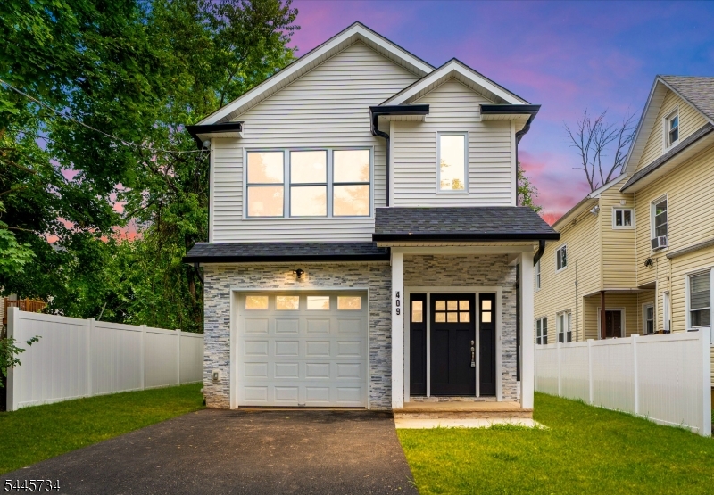 Welcome to this exceptional new construction colonial single family home offering approximately 2,489 square feet of beautifully designed modern living space.This 5 bedroom, 4 bathroom home combines timeless architecture with modern finishes and an open, functional floor plan. The first floor features a grand foyer, formal living room, formal dining room, bedroom or office, full bathroom, and attached garage. The gourmet kitchen is equipped with custom cabinetry, premium countertops, stainless steel appliances, a large center island, and sliding glass doors leading to a backyard patio, ideal for entertaining. The second level includes a luxurious primary suite with tray ceilings, two walk-in closets, and a spa inspired ensuite bath featuring a soaking tub, dual vanities, and a separate shower. Three additional spacious bedrooms, well appointed bathrooms, and a convenient second floor laundry room complete the upper level. Additional features include central air, energy efficient construction, a 10 year builder warranty, and a prime location close to shopping, dining, schools, parks, and NYC transportation. Eligible buyers may qualify for down payment and closing cost assistance through approved lenders, with 100% financing available for qualified purchasers. Seller concessions are only available for strong offers over the list price. This home will not last for long schedule a viewing today to avoid dissapointment.