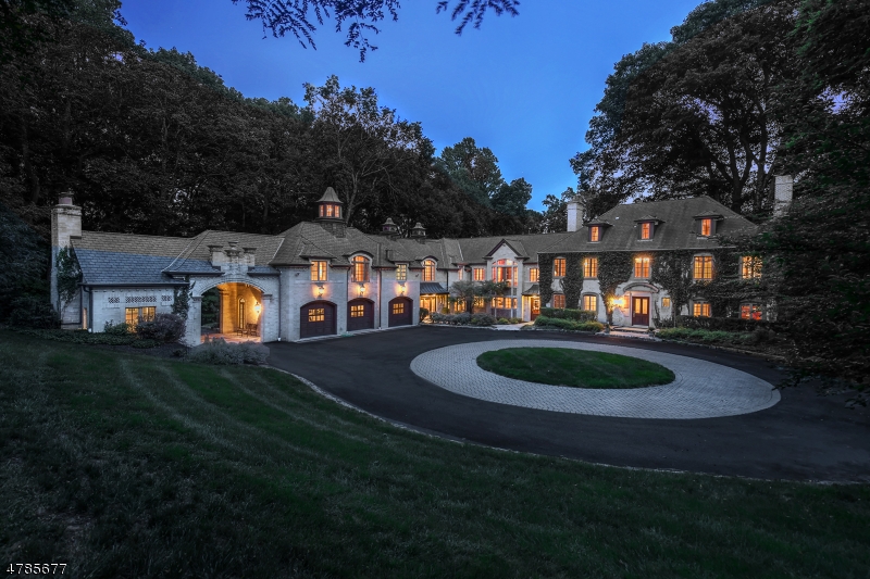 Impressive French Country Manor "Strawberry Fields" on 7.3 ac. in coveted Washington Valley. Built in 1929, this extraordinary home was beautifully expanded in 1998 by renowned architect Peter Dorne. Elegant walls of windows, stunning millwork, solid mahogany 3-car garage doors, illuminated cupolas and distinctive chimneys. Gourmet kitchen; 5 en suite bedrooms; 7 full baths and 2 powder rooms; multi-functional third floor space. Potting Room has dramatic floor-to-ceiling wood-burning stone fireplace. Outdoor pool and spa with expansive pool patio area. Separate 1 BR, 2 full bath, 3-car legal rental Carriage House has own utilities, septic system, fully equipped kitchen, washer/dryer. Convenient to vibrant downtown Morristown.