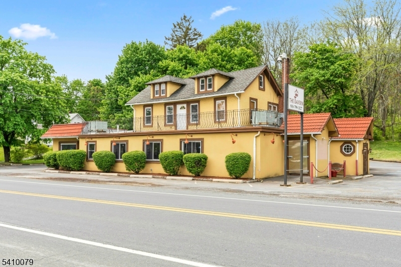 Fantastic Opportunity! Own Your Own Restaurant & Bar. Includes a Spacious 2 Bedroom Apartment Upstairs For Additional Income. Great Location, High Visibility On Rt 46 in Warren County NJ. Class C Liquor License Included. Whether You Bring Fine Dining Or Good Old Fashioned Home Cooking.  Bring Your Business Ideas To The Countryside. All Kitchen Equipment & Furnishings As Is. Large Rustic Bar. Dining Area w/ Lots of Roomy Space Inside & Out. Lower Level Has Lockable Liquor Storage Room & Wine Storage w/ an Office. Ample Parking. Upstairs Apartment. Rent For Additional Income. Great Investment Opportunity. Bring Your Dreams Here. Minutes To The Well Known Land of Make Believe Amusement Park. Location-Location-Location. Near Routes 80, 46 & 31. Approximately 1 Hour from NYC. Price Reflects As Is Condition and Cesspool.
