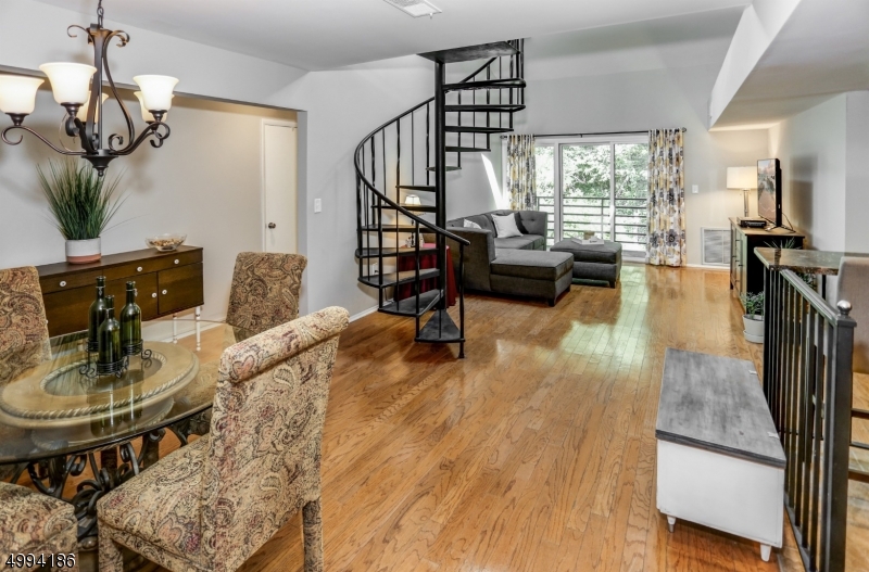 This is the one!  Beautifully renovated 2 story end unit on top floor.  Private modern unit with wooded views of National Park, yet steps away from bustling Morristown Center.  2 bed 2 bath with loft. Recent renovations include baths & kitchen approx 2015, HVAC fully replaced 2016, Master Bed Carpet 2017, Washer/Dryer 2017, Guest Bed Carpet 2019, Painting of master bed, living rm & loft 2020.  Loft has open space  and a separate room for office/guest quarters.  Closet organizers in master bed closets. Building has secure lobby & gym with xtra storage unit.  So close to shopping, restaurants, & theater of Morristown center plus the mid town direct train.  Parking is 1 assigned space 1 additional space 1st come 1st served. Maximum of 2 cars per unit. Enjoy the fun of Morristown & the serene living of this unit.