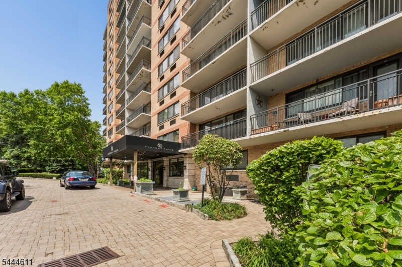 Experience effortless living in this beautifully maintained one-bedroom residence located on the first floor of a sought-after high-rise community. Designed for both comfort and convenience, the home features an updated kitchen with stainless steel appliances, a spacious and functional layout, and one assigned parking space. Residents enjoy an exceptional collection of amenities, including 24-hour concierge service, a fully equipped fitness center, resident lounge with a TV and pool table, media room, laundry facilities, and a beautifully landscaped outdoor BBQ and picnic area. Perfectly situated for commuters, NYC bus service is conveniently located just outside the building, with shopping, dining, and everyday conveniences all within easy reach.