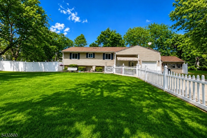 Meticulously maintained bi-level home featuring numerous upgrades throughout. The main level offers 3 bedrooms, 2 full bathrooms, a spacious living room, dining room, and updated kitchen, plus a rear addition with an office. The lower level, partially below grade at the rear, includes an additional bedroom, family room, and office space   ideal for extended living or working from home. Situated on approximately 0.35 acres, the fully fenced front and backyard is perfect for entertaining, complete with an above-ground pool and hot tub. Major updates include: Roof (2014), Whole House Generator (2013), Electrical Panel (2013), Deck & Pool (2021), Jacuzzi (2020), Furnace (2023), and Central Air Conditioning (2023).Too many upgrades to list   this is truly a must-see home!